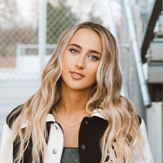 Rising Country Artist Ashley Cooke, Who Has A Million Followers On TikTok, Talks About Her Hit “Never Til Now” (feat. Brett Young) And New Songs 1 Ashley Cooke
